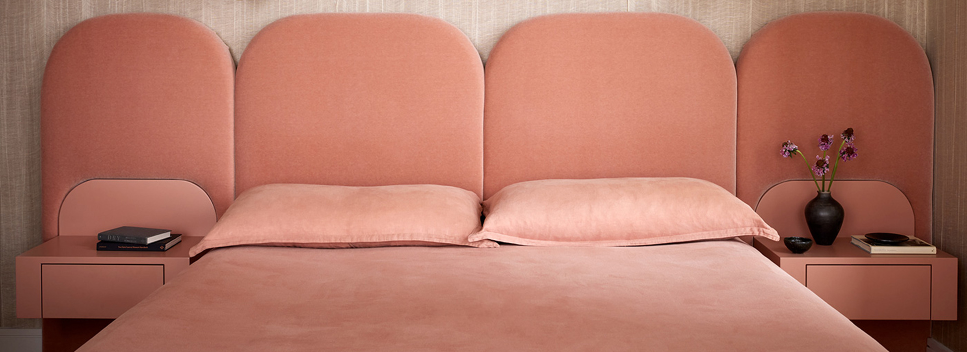 Custom Wall length velvet head board and bed with built in bedside tables designed by Laurie Blumenfeld Russo