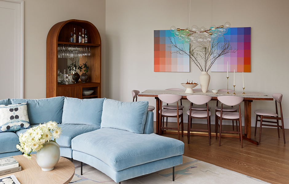 Open Modern Living Dining Room with Custom Curved Sofa and Colorful Contemporary Abstract Art Brooklyn NYC Interior Design by Laurie Blumenfeld Design
