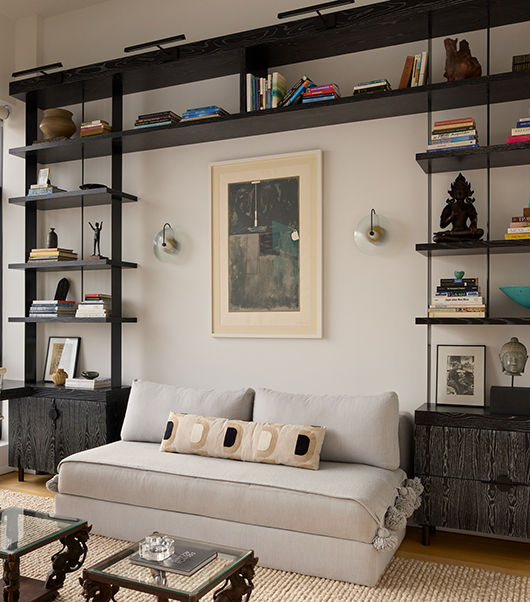 Custom cerused wood window desk by Laurie Blumenfeld with powder-coated black metal details in a modern home office.